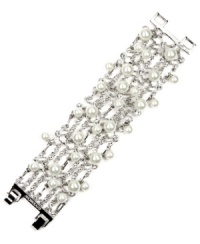 You can never have too much shine, and Givenchy's flaunt-worthy flex bracelet pulls out all the stops. Crafted in silver-plated mixed metal, bracelet is adorned with glass pearls and white glass accents. Approximate length: 7-1/4 inches. You can never have too much shine, and Givenchy's flaunt-worthy flex bracelet pulls out all the stops. Crafted in silver-plated mixed metal, bracelet is adorned with glass pearls and white glass accents. Approximate length: 7-1/4 inches.