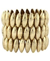 Cuff it out. Edgy oval beads form a three-row design that's a total knockout on Jessica Simpson's stretch cuff bracelet. Set in gold tone mixed metal. Approximate length: 8 inches. Cuff it out. Edgy oval beads form a three-row design that's a total knockout on Jessica Simpson's stretch cuff bracelet. Set in gold tone mixed metal. Approximate length: 8 inches.