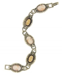 Cameo appearance. 2028's chain link bracelet features vintage inspiration in the form of a cameo motif. Crafted in brass tone mixed metal, opaque resin, and vintage German glass stones, it's sure to add a romantic sense of antique chic to your style. Approximate length: 7 inches. Cameo appearance. 2028's chain link bracelet features vintage inspiration in the form of a cameo motif. Crafted in brass tone mixed metal, opaque resin, and vintage German glass stones, it's sure to add a romantic sense of antique chic to your style. Approximate length: 7 inches.