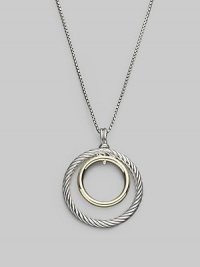 Double circles, one of cabled sterling silver, the other of smooth 18k gold, make a pretty pairing hanging from a silver box chain. Sterling silver and 18k yellow gold Chain length, about 17 to 18 Pendant diameter, about 1¼ Lobster clasp Imported Double circles, one of cabled sterling silver, the other of smooth 18k gold, make a pretty pairing hanging from a silver box chain. Sterling silver and 18k yellow gold Chain length, about 17 to 18 Pendant diameter, about 1¼ Lobster clasp Imported
