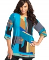 Liven up your leggings with Style&co.'s three-quarter-sleeve plus size tunic top, broadcasting a vibrant print!