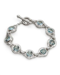 Genuine David Yurman (TM) Bracelet. Charles Krypell Sterling Silver & Blue Topaz Toggle Bracelet, 9/10 Condition. grams in weight. 100% Satisfaction Guaranteed. Genuine David Yurman (TM) Bracelet. Charles Krypell Sterling Silver & Blue Topaz Toggle Bracelet, 9/10 Condition. grams in weight. 100% Satisfaction Guaranteed.