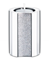 The Ambiray medium candle holder from Swarovski presents sleek, stainless steel heightened with dozens of tiny faceted clear crystals, creating a home accent that truly radiates glamour and sophistication. The Ambiray medium candle holder from Swarovski presents sleek, stainless steel heightened with dozens of tiny faceted clear crystals, creating a home accent that truly radiates glamour and sophistication.