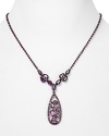 So spectacular with everything from basic jeans to slinky LBDs: A richly colored pendant sparkles on this Carolee Lux necklace, off set by hematite plate.