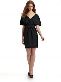 A streamlined luxe wool design in a notice-me shade, with a double V neckline and dolman sleeves.Double V neckline Dolman sleeves Banded waist Pleated skirt Back zipper Angled side pockets Back zipper Fully lined About 34½ from shoulder to hem Wool; dry clean Made in USA A streamlined luxe wool design in a notice-me shade, with a double V neckline and dolman sleeves.Double V neckline Dolman sleeves Banded waist Pleated skirt Back zipper Angled side pockets Back zipper Fully lined About 34½ from shoulder to hem Wool; dry clean Made in USA