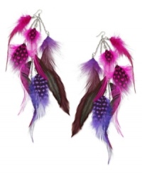 Fun & flirty! Get exotic with these long earrings that feature a cluster of feathers with pops of fuchsia. Accented with mixed metal and silver-plating. Approximate drop: 7 inches. Fun & flirty! Get exotic with these long earrings that feature a cluster of feathers with pops of fuchsia. Accented with mixed metal and silver-plating. Approximate drop: 7 inches.