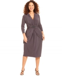 Jones New York's latest plus size look features flattering details, like a brooch-adorned, ruched waistband and peplum tiers at the hips. Jones New York's latest plus size look features flattering details, like a brooch-adorned, ruched waistband and peplum tiers at the hips.
