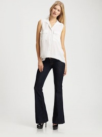 70s inspired stretch denim has a retro flare to enhance dramatic curves.THE FITFitted through hips and thighs Flared leg Rise, about 8 Inseam, about 34THE DETAILSZip fly Five-pocket style Plain back patch pockets 92% cotton/7% polyester/1% spandex; machine wash Made in USA 70s inspired stretch denim has a retro flare to enhance dramatic curves.THE FITFitted through hips and thighs Flared leg Rise, about 8 Inseam, about 34THE DETAILSZip fly Five-pocket style Plain back patch pockets 92% cotton/7% polyester/1% spandex; machine wash Made in USA
