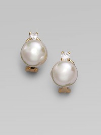 A lustrous round white pearl stud, with a sparkling cubic zirconia accent, set in 18k gold vermeil. 12mm white round organic man-made pearls Cubic zirconia 18k gold vermeil 14k gold post Post-and-hinge back Made in Spain