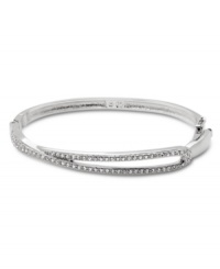Demure enough for daytime yet equally elegant for evening, Swarovski's Hermine Bangle is a perfectly practical and versatile style. Crafted in silver tone mixed metal, it's adorned with glittering pavé crystals. Approximate length: 7-1/4 inches. Demure enough for daytime yet equally elegant for evening, Swarovski's Hermine Bangle is a perfectly practical and versatile style. Crafted in silver tone mixed metal, it's adorned with glittering pavé crystals. Approximate length: 7-1/4 inches.