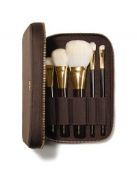 The Tom Ford Brush Set brings ease and luxury to applying your makeup. 5 brushes are meticulously crafted from the finest fibers to perform expertly with Tom Ford color cosmetics. The mahogany-brown, soft-sided portfolio, finished with Tom Ford's signature goldtone zipper, holds the TOM FORD Shade And Illuminate Brush, Bronzer Brush, Cheek Brush, Eye Shadow Contour Brush and Eye Shadow Brush. The Tom Ford Brush Set brings ease and luxury to applying your makeup. 5 brushes are meticulously crafted from the finest fibers to perform expertly with Tom Ford color cosmetics. The mahogany-brown, soft-sided portfolio, finished with Tom Ford's signature goldtone zipper, holds the TOM FORD Shade And Illuminate Brush, Bronzer Brush, Cheek Brush, Eye Shadow Contour Brush and Eye Shadow Brush.