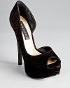 A d'Orsay silhouette gets a lift from a towering five-and-a-half inch heel. From STEVEN BY STEVE MADDEN.