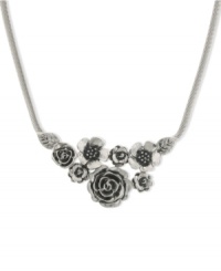 Pick some flowers this season. 2028's bib necklace features a bouquet of detailed floral pendants. Crafted in silver tone mixed metal. Approximate length: 16 inches + 3-inch extender. Approximate drop: 2-1/2 inches. Pick some flowers this season. 2028's bib necklace features a bouquet of detailed floral pendants. Crafted in silver tone mixed metal. Approximate length: 16 inches + 3-inch extender. Approximate drop: 2-1/2 inches.
