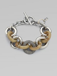 This mixed-media design features horn print acetate, sleek silvertone and rhinestone encrusted, graduated links. Steel and brassAcetateGlass stonesLength, about 8½Toggle closureImported This mixed-media design features horn print acetate, sleek silvertone and rhinestone encrusted, graduated links. Steel and brassAcetateGlass stonesLength, about 8½Toggle closureImported