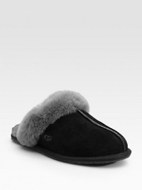 Shearling lining and trim create the ultimate in casual luxury. Round-toe design Rubber sole Imported Fur origin: AustraliaOUR FIT MODEL RECOMMENDS ordering true size.. Shearling lining and trim create the ultimate in casual luxury. Round-toe design Rubber sole Imported Fur origin: AustraliaOUR FIT MODEL RECOMMENDS ordering true size..