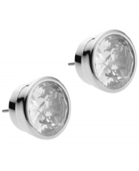 Don't be dull, be dazzling! Michael Kors' sparkling stud earrings feature bezel-set clear crystals in a polished silver tone mixed metal setting. Approximate diameter: 1/2 inch. Don't be dull, be dazzling! Michael Kors' sparkling stud earrings feature bezel-set clear crystals in a polished silver tone mixed metal setting. Approximate diameter: 1/2 inch.