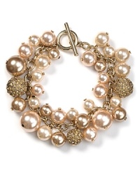 Always have something precious up your sleeve. With gleaming chains and crystal-adorned stations, this clustered bracelet from Carolee is a glamorous take on pearls. Always have something precious up your sleeve. With gleaming chains and crystal-adorned stations, this clustered bracelet from Carolee is a glamorous take on pearls.