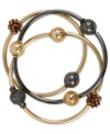 Stack up fiery style. Kenneth Cole New York's three bangle set features shimmering faceted fireball beads. Crafted in gold tone and hematite tone mixed metal. Bracelets stretch to fit wrist. Approximate diameter: 2-1/4 inches.