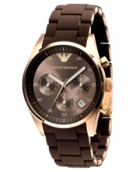 Beat the blues with this warm-hued watch by Emporio Armani. Brown silicone-wrapped gold tone stainless steel bracelet and round case. Brown chronograph dial with gold tone numerals, logo, date window and three subdials. Quartz movement. Water resistant to 50 meters. Two-year limited warranty. Beat the blues with this warm-hued watch by Emporio Armani. Brown silicone-wrapped gold tone stainless steel bracelet and round case. Brown chronograph dial with gold tone numerals, logo, date window and three subdials. Quartz movement. Water resistant to 50 meters. Two-year limited warranty.
