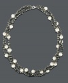 Luxury in layers. This chic, three strand necklace highlights white and grey cultured freshwater pearls (6-7 mm), sparkling hematite beads (264-3/4 ct. t.w.) and a polished sterling silver setting. Approximate length: 17 inches.