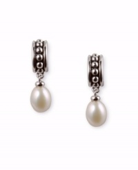 The classic elegance of cultured freshwater pearls mixed with the modern playfulness of sterling silver. The classic elegance of cultured freshwater pearls mixed with the modern playfulness of sterling silver.