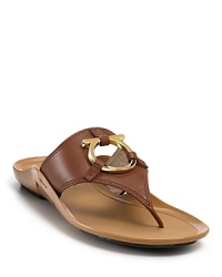 A casual classic gets dressed up with luxe leather and a shining gancini detail. From Salvatore Ferragamo. A casual classic gets dressed up with luxe leather and a shining gancini detail. From Salvatore Ferragamo.