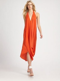 Sweetly sophisticated silhouette with an alluringly low scoopback and asymmetrical hi-low hem. V-neckHalter topAsymmetrical hi-low hemPlunging scoopbackAbout 26 from natural waistPolyesterDry cleanImportedModel shown is 5'10 (177cm) wearing US size Small. Sweetly sophisticated silhouette with an alluringly low scoopback and asymmetrical hi-low hem. V-neckHalter topAsymmetrical hi-low hemPlunging scoopbackAbout 26 from natural waistPolyesterDry cleanImportedModel shown is 5'10 (177cm) wearing US size Small.