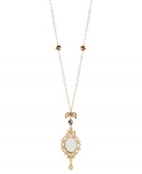 Who's the fairest of them all? You, with this necklace from Betsey Johnson. Crafted from gold-tone mixed metal, the necklace features a mirror pendant at the center, with beads and crystal accents for added shine. Approximate length: 29 inches + 3-inch extender. Approximate drop: 5-1/4 inches. Who's the fairest of them all? You, with this necklace from Betsey Johnson. Crafted from gold-tone mixed metal, the necklace features a mirror pendant at the center, with beads and crystal accents for added shine. Approximate length: 29 inches + 3-inch extender. Approximate drop: 5-1/4 inches.