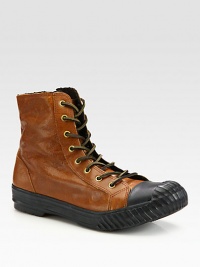 A combination of signature sporty style with a rugged sensibility, this short all-weather boot is handsomely crafted from a smooth, yet sturdy leather with a winterized lining for added warmth and protection.LeatherPadded insoleRubber soleImported A combination of signature sporty style with a rugged sensibility, this short all-weather boot is handsomely crafted from a smooth, yet sturdy leather with a winterized lining for added warmth and protection.LeatherPadded insoleRubber soleImported
