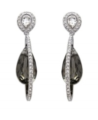 Dawn to dusk elegance. Swarovski's pierced earrings radiate timeless sophistication. A black crystal dangles within a silver tone mixed metal drop. A touch of clear crystal pavé adds an exquisite sparkle. Approximate drop: 1-5/8 inches. Dawn to dusk elegance. Swarovski's pierced earrings radiate timeless sophistication. A black crystal dangles within a silver tone mixed metal drop. A touch of clear crystal pavé adds an exquisite sparkle. Approximate drop: 1-5/8 inches.