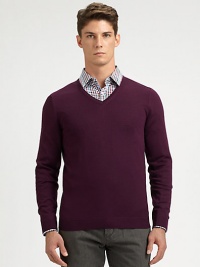 Slim-fitting, extra-fine virgin wool sweater with contrast color detail at inside collar trim.V-neckRibbed knit cuffs and hemWoolDry cleanImported Slim-fitting, extra-fine virgin wool sweater with contrast color detail at inside collar trim.V-neckRibbed knit cuffs and hemWoolDry cleanImported