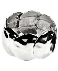 Get-up-and-go glam. The effortless stretch design on Nine West's polished bracelet style make it an effortless addition to your collection. A simple, yet stunning, overlapping circle pattern is crafted in imitation rhodium-plated mixed metal. Approximate diameter: 2-1/2 inches. Get-up-and-go glam. The effortless stretch design on Nine West's polished bracelet style make it an effortless addition to your collection. A simple, yet stunning, overlapping circle pattern is crafted in imitation rhodium-plated mixed metal. Approximate diameter: 2-1/2 inches.