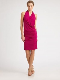 Vibrant, artfully draped silk, tailored in a sexy halter silhouette.Surplice halter necklineRuched bodyBack button closureFully linedAbout 21 from natural waist68% acetate/27% polyester/5% spandexDry cleanMade in USA of imported fabricModel shown is 5'11 (180cm) wearing US size Small. Vibrant, artfully draped silk, tailored in a sexy halter silhouette.Surplice halter necklineRuched bodyBack button closureFully linedAbout 21 from natural waist68% acetate/27% polyester/5% spandexDry cleanMade in USA of imported fabricModel shown is 5'11 (180cm) wearing US size Small.