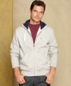 Check under the hood. This hoodie from Tommy Hilfiger is ready for your casual collection.