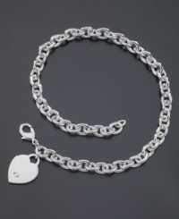 A stunning chain ends with a simple heart charm on this versatile necklace by GUESS. Logo at charm. Approximate length: 15 inches. A stunning chain ends with a simple heart charm on this versatile necklace by GUESS. Logo at charm. Approximate length: 15 inches.
