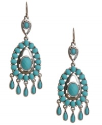 Chic chandelier earrings infused by summery hues. Lucky Brand's delicate teardrop-shaped style features epoxy cabochon in turquoise hues set in silver tone mixed metal. Approximate drop: 2-7/8 inches.
