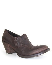 This Luxury Rebel design is an abbreviated, no-frills take on the Western booties trend. Switch them out with your favorite flats for an instant wardrobe kick-up. This Luxury Rebel design is an abbreviated, no-frills take on the Western booties trend. Switch them out with your favorite flats for an instant wardrobe kick-up.