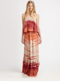 Sunrise-hued watercolors on airy chiffon, all in a stunning floor-sweeping maxi.Spaghetti strapsScoopneckCropped bodice overlayTiered ruffles at hemBack tie detailAbout 45 from natural waistRayonMachine washMade in USAModel shown is 5'11 (180cm) wearing US size Small. Sunrise-hued watercolors on airy chiffon, all in a stunning floor-sweeping maxi.Spaghetti strapsScoopneckCropped bodice overlayTiered ruffles at hemBack tie detailAbout 45 from natural waistRayonMachine washMade in USAModel shown is 5'11 (180cm) wearing US size Small.