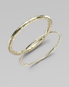 A simple, sophisticated, slender bangle of 18k yellow gold with a rich hammered texture. 18k yellow gold Diameter, about 2½ Imported Please note: Bracelets sold separately.