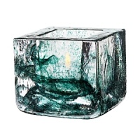 Designed by Kosta Boda's Anna Ehrner, the Brick series chicly creates artful ambiance. Floating splashes of black, white, blue, green and purple make each transparent votive unique. Designed by Kosta Boda's Anna Ehrner, the Brick series chicly creates artful ambiance. Floating splashes of black, white, blue, green and purple make each transparent votive unique.