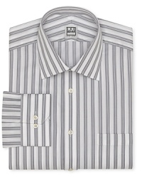 A two-stripe design doubles the pleasure of this handsome dress shirt from Ike Behar, tailored for a comfortable, regular fit for your days behind the desk. A two-stripe design doubles the pleasure of this handsome dress shirt from Ike Behar, tailored for a comfortable, regular fit for your days behind the desk.