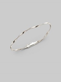 Simply stunning, this 18k gold bangle with delicate ridges and twists is great on its own, even better when stacked in multiples. 18k gold Diameter, about 2½ Tongue-and-groove clasp Imported Please note: Bracelets sold separately. Simply stunning, this 18k gold bangle with delicate ridges and twists is great on its own, even better when stacked in multiples. 18k gold Diameter, about 2½ Tongue-and-groove clasp Imported Please note: Bracelets sold separately.