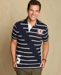 Collegiate cool is always in. This striped and crested polo from Tommy Hilfiger adds some preppy style to your fall wardrobe.