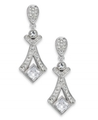 Glamour takes center stage with the Grandeur linear earrings from Eliot Danori. Crafted from rhodium-plated brass, the earrings illuminate with crystal and cubic zirconias (2-1/2 ct. t.w.). Approximate drop: 1-1/2 inches. Glamour takes center stage with the Grandeur linear earrings from Eliot Danori. Crafted from rhodium-plated brass, the earrings illuminate with crystal and cubic zirconias (2-1/2 ct. t.w.). Approximate drop: 1-1/2 inches.