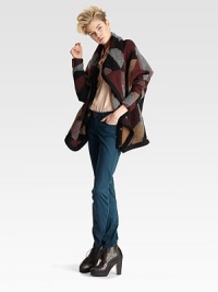Strategically placed overlays and a graphically charged pattern define this textured, wool-rich jacket. Front snap closuresLong sleevesFully linedAbout 29 from shoulder to hem73% wool/27% polyesterDry cleanImported of Italian fabricModel shown is 5'9½ (176cm) wearing US size 2. Strategically placed overlays and a graphically charged pattern define this textured, wool-rich jacket. Front snap closuresLong sleevesFully linedAbout 29 from shoulder to hem73% wool/27% polyesterDry cleanImported of Italian fabricModel shown is 5'9½ (176cm) wearing US size 2.