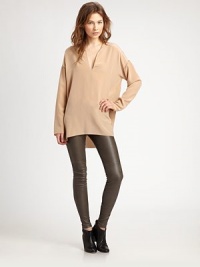 Sumptuous matte silk in an elongated tunic style finished with delicate picot stitching.Split V-neckDropped shouldersLong sleevesSilkDry cleanImportedModel shown is 5'11 (180cm) wearing US size Small. Sumptuous matte silk in an elongated tunic style finished with delicate picot stitching.Split V-neckDropped shouldersLong sleevesSilkDry cleanImportedModel shown is 5'11 (180cm) wearing US size Small.