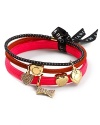 A set of three stylish metallic hair elastics with signature MARC BY MARC JACOBS charms.