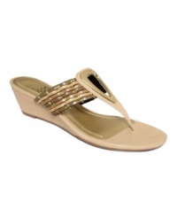Treat your feet to truly unique style. The Golda sandals by Impo are just what you're looking for with their bold details and wearable wedge heel. Treat your feet to truly unique style. The Golda sandals by Impo are just what you're looking for with their bold details and wearable wedge heel.