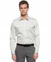 Freshen up your workweek look with this woven shirt from Calvin Klein with dobby striping.