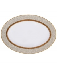 Noritake makes any occasion memorable with the opulent Odessa Gold oval platter. Wide bands of etched gold and pale gray with delicate blooms adorn classic bone china. Noritake makes any occasion memorable with the opulent Odessa Gold oval platter. Wide bands of etched gold and pale gray with delicate blooms adorn classic bone china.